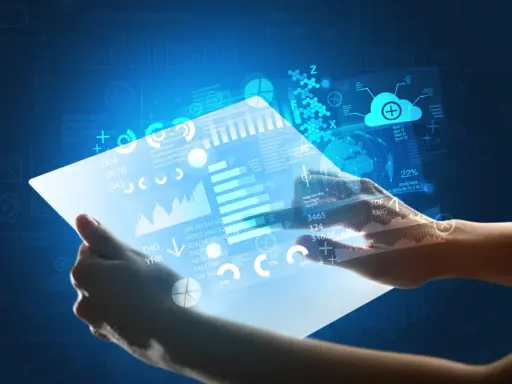 Hands holding a futuristic tablet displaying glowing data, charts, and a globe.