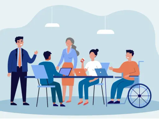 Team di lavoro eterogeneo, con persone di diverse età e un uomo in carrozzina, che collaborano in un ufficio moderno. Esempio di diversity management.